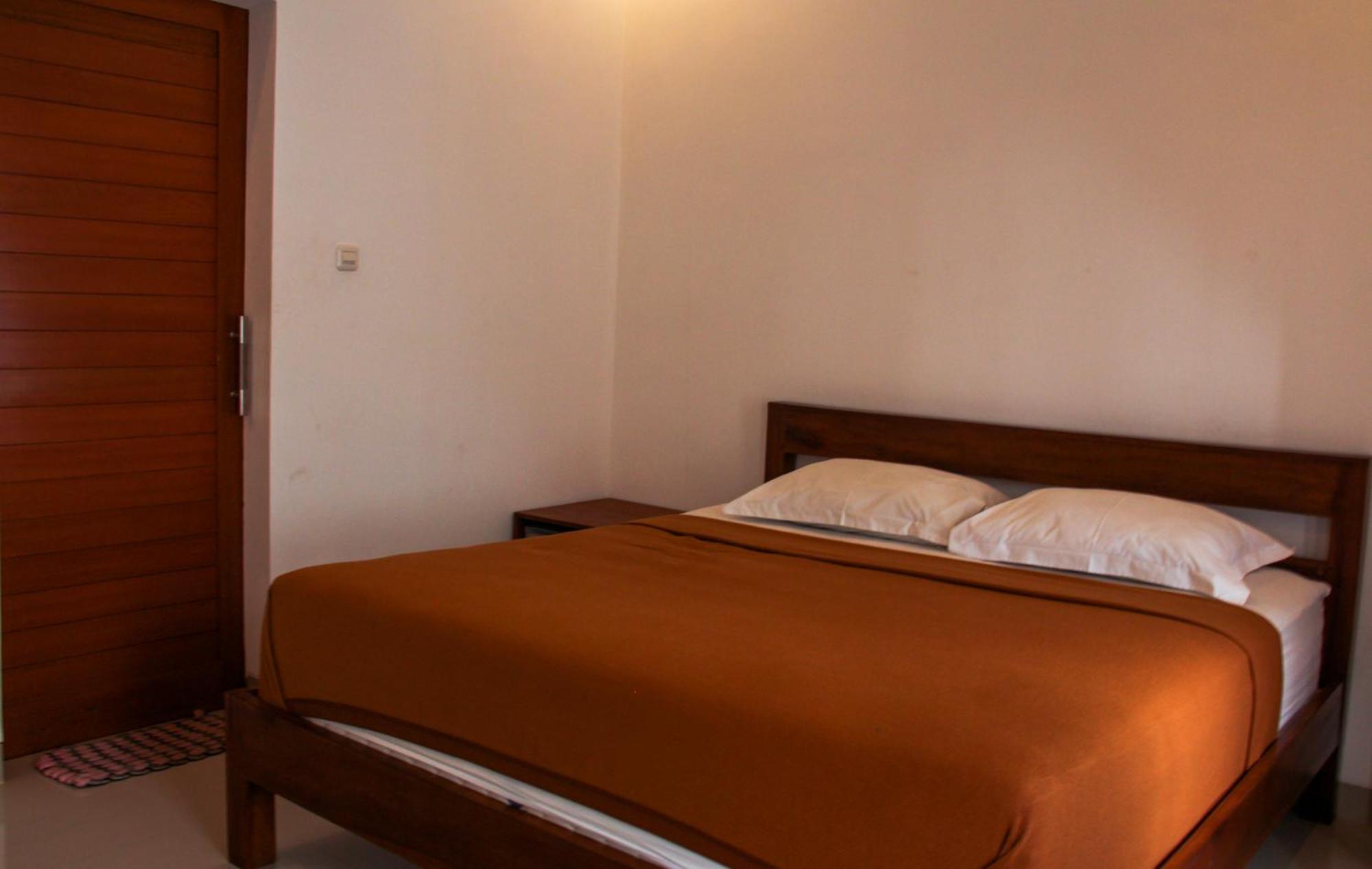 Nyoman Guesthouse Canggu Номер фото