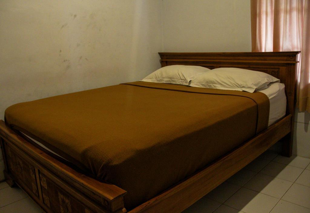 Nyoman Guesthouse Canggu Номер фото
