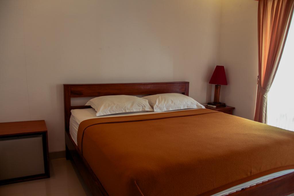 Nyoman Guesthouse Canggu Номер фото