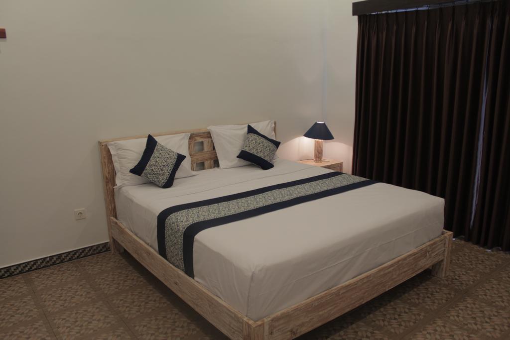 Nyoman Guesthouse Canggu Номер фото